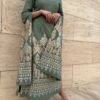 Green embroidered gown