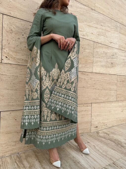 Green embroidered gown